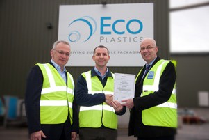 ECO Plastics' Simon Faulkner (L) and David Jarvis (centre) is presented with the certificate by Lionel Westall from LRQA